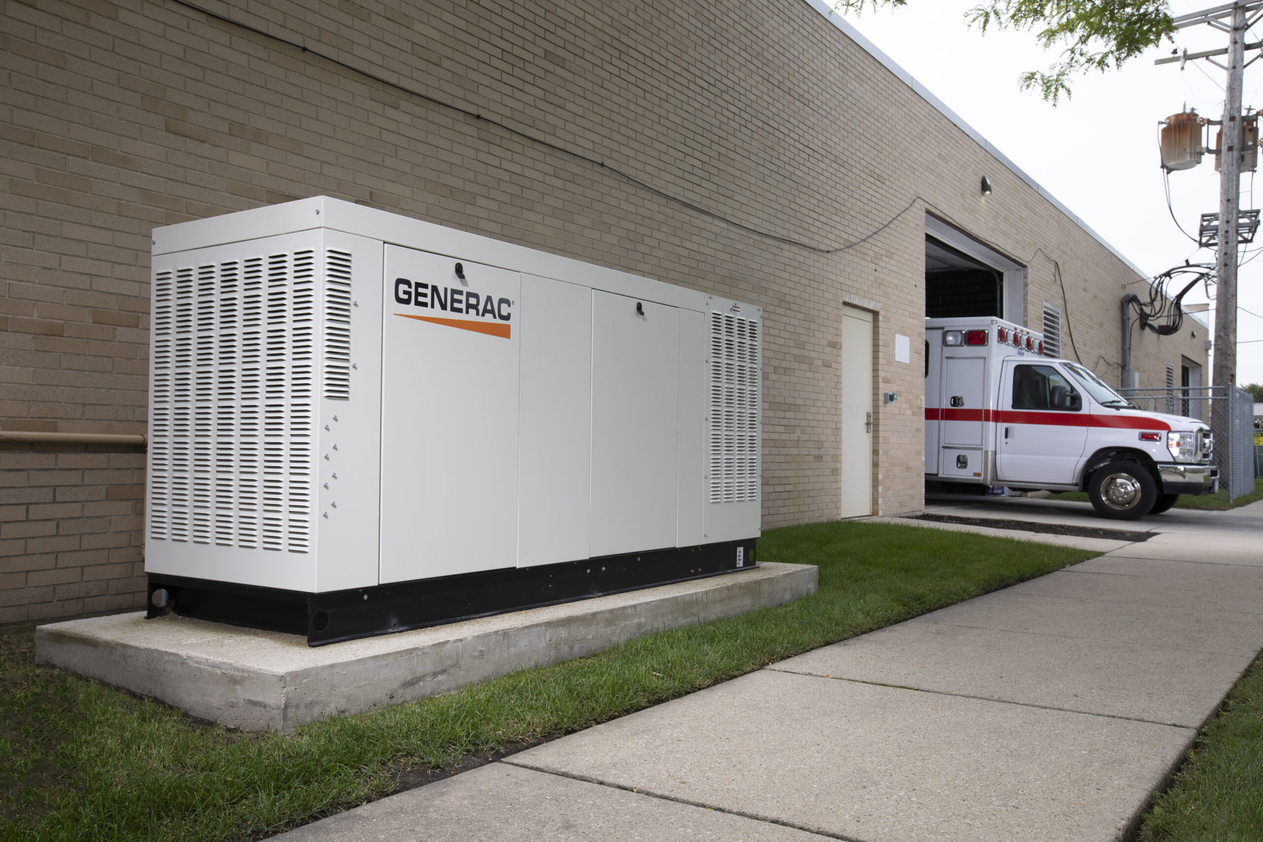 A business owner is happy that he has backup power with a commercial generator when there's a power outage